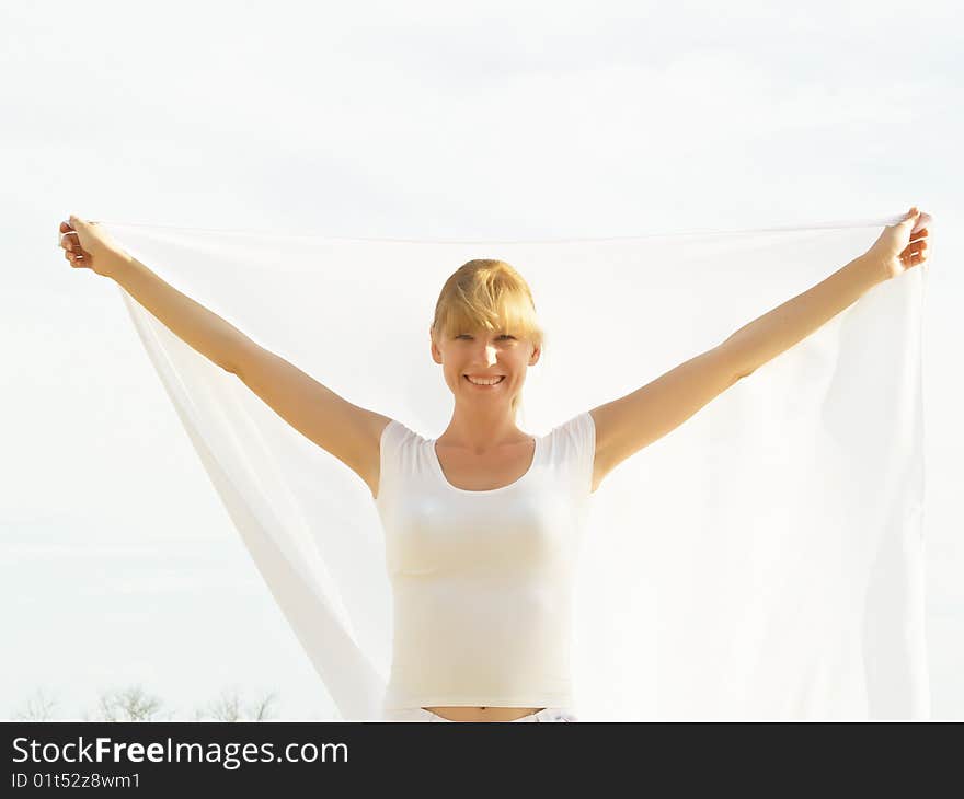 Session of a relaxation on a background of the years sky of the girl in white