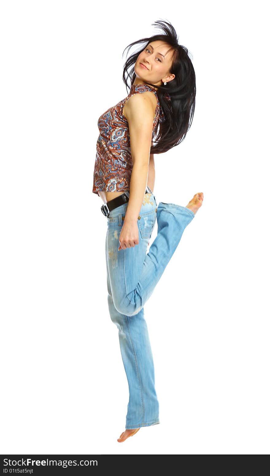 Young jumping woman.Isolated on white background