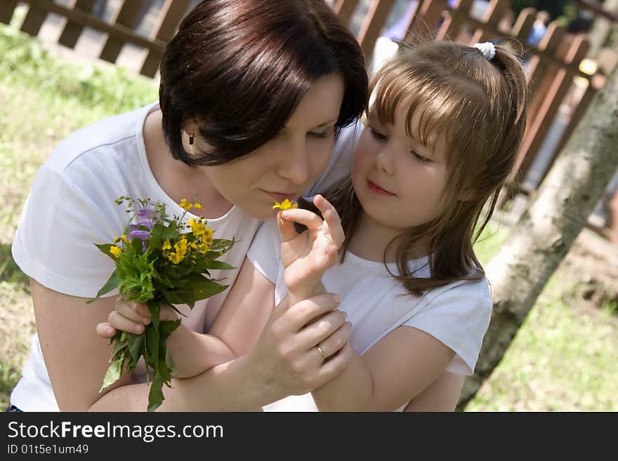 Happy mum and her small daughter