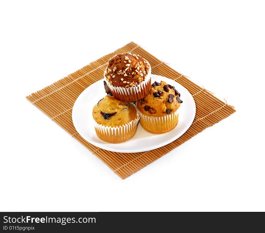 Different favor baked muffin on bamboo mat. Different favor baked muffin on bamboo mat