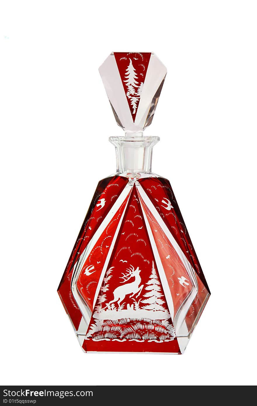 Red crystal carafe with prancing deer isolated