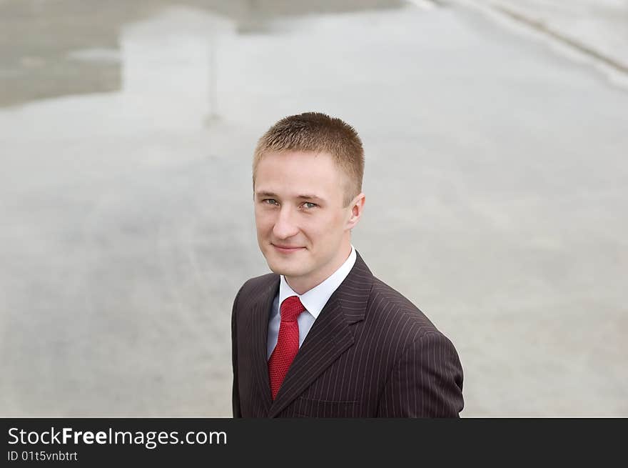 Portrait of a young businessman outdoor the office