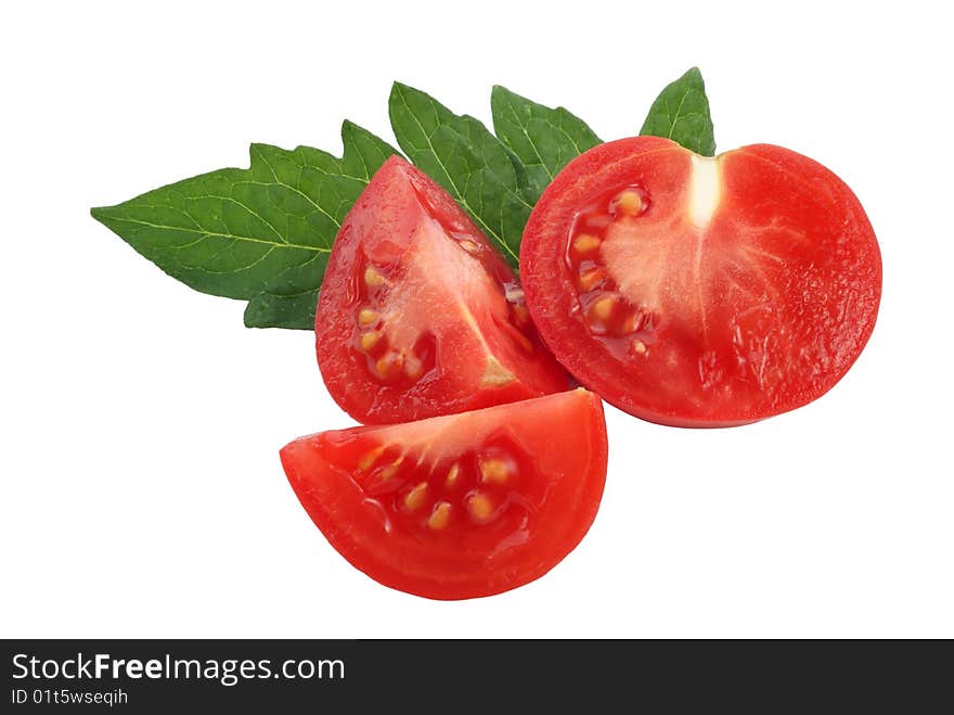 Slices  of tomato and tomato leaf on white background. Slices  of tomato and tomato leaf on white background