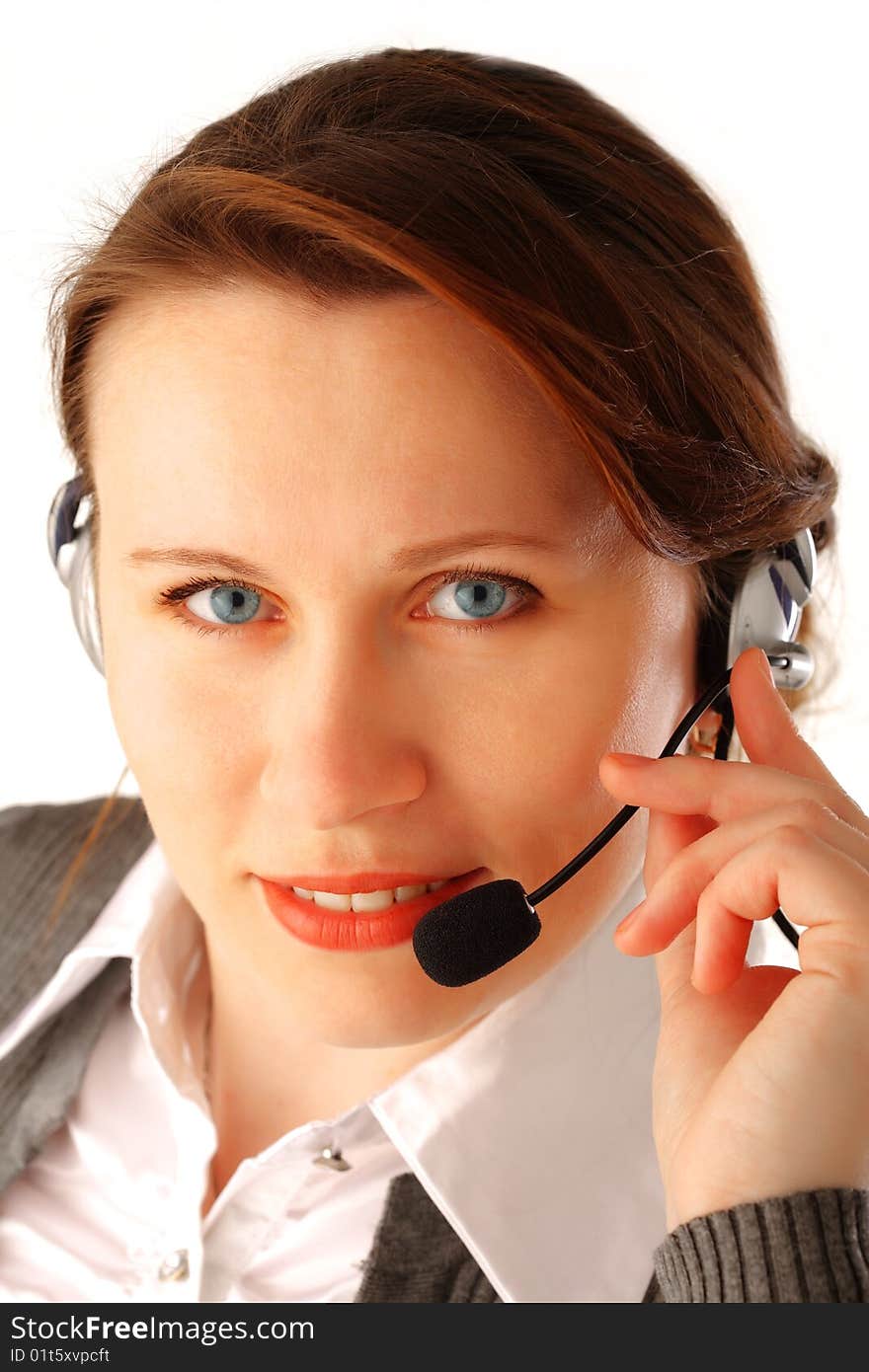 Closeup portrait of a young woman with headset, isolated over white background. Closeup portrait of a young woman with headset, isolated over white background