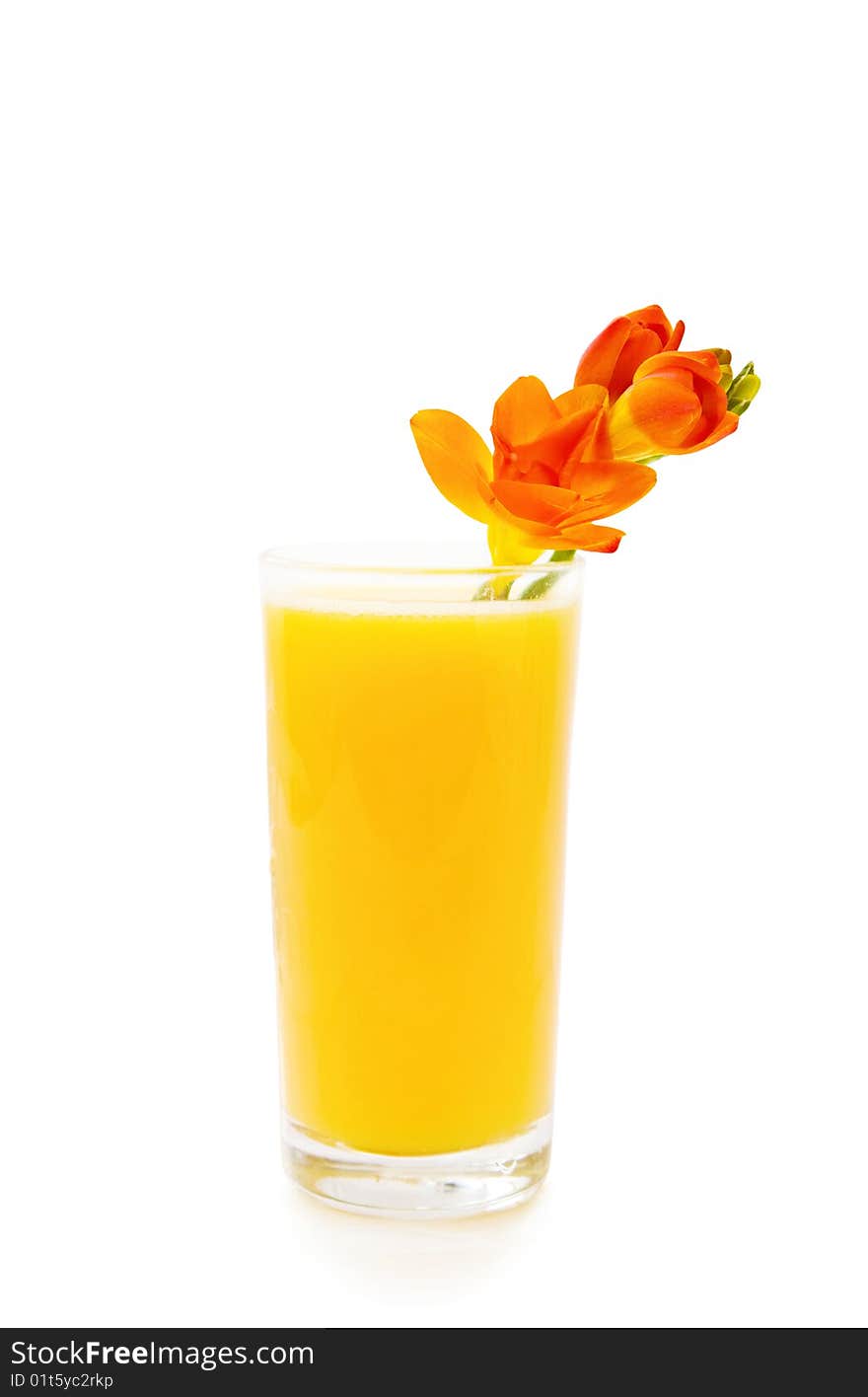 Glass of orange juice on white