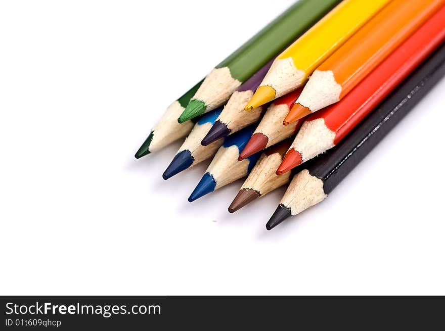 Bunch of colorful pencils against a white background