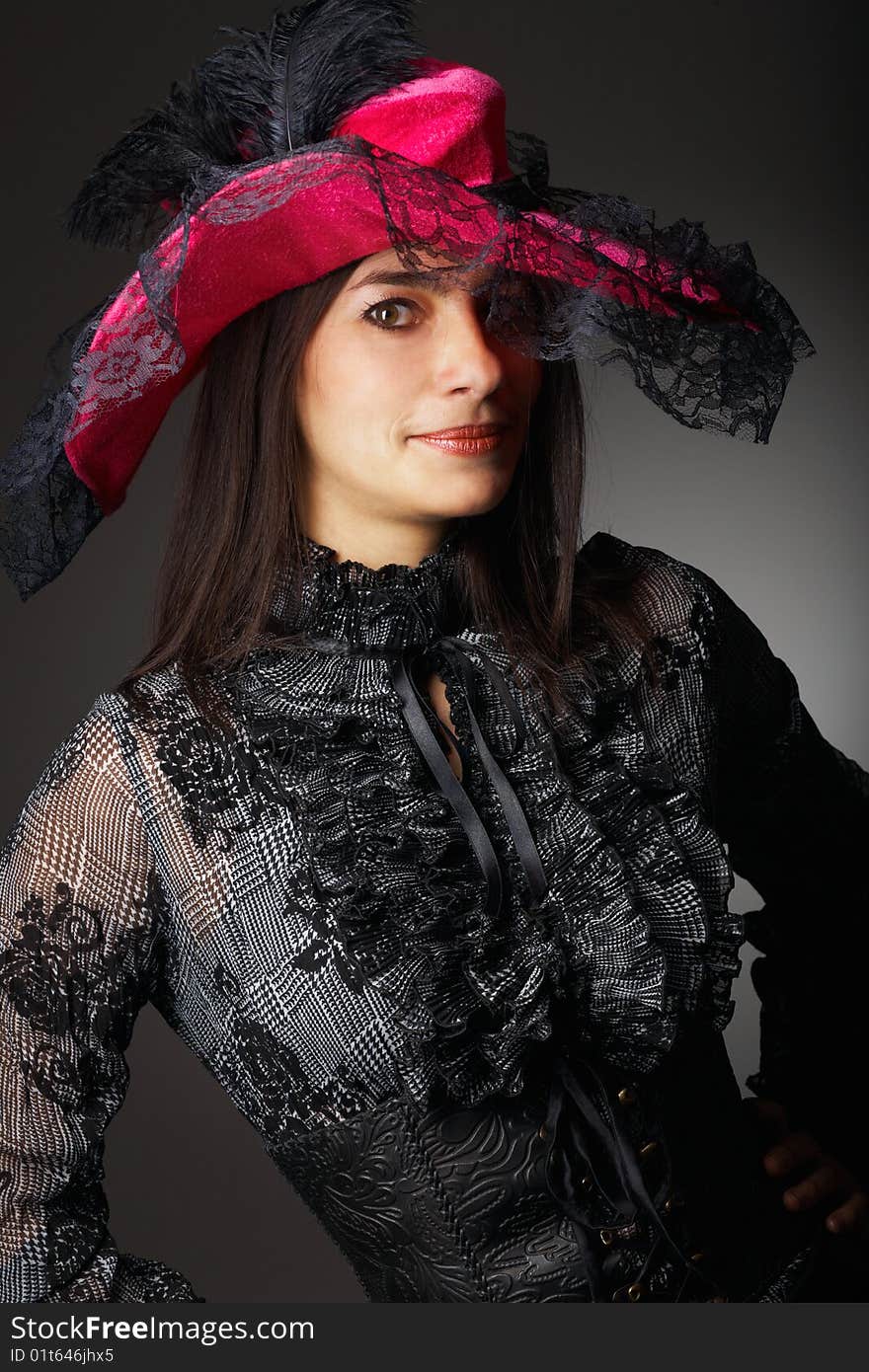 Beautiful woman in pink hat. Close-up view