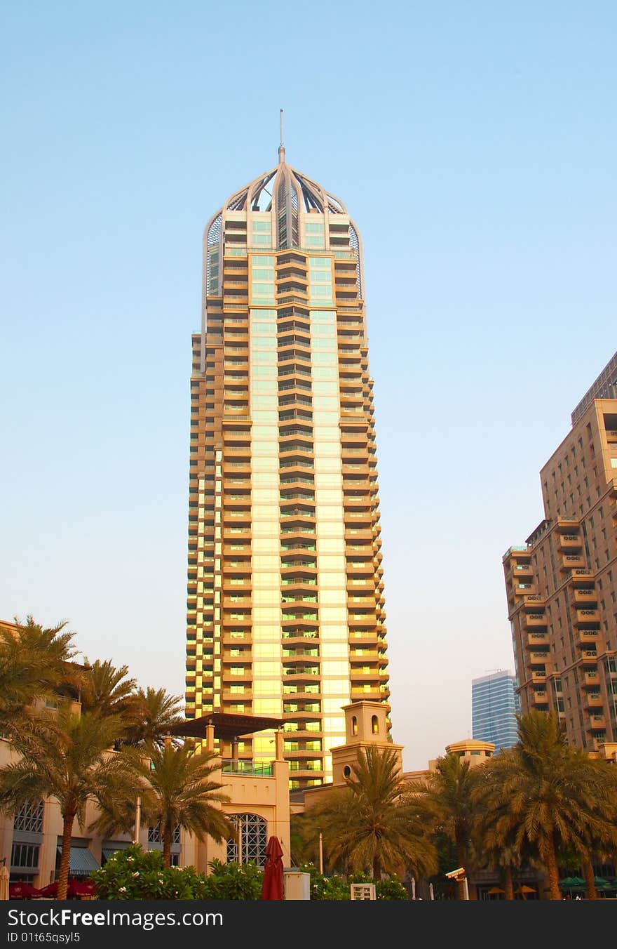 Sun setting on a luxury highrise building in Dubai. Sun setting on a luxury highrise building in Dubai