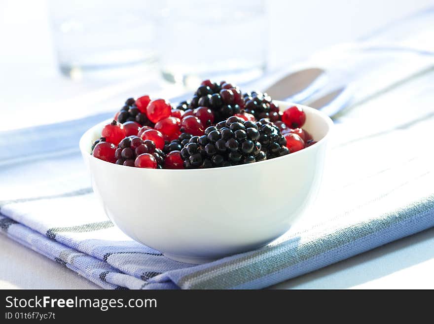 Dessert with redcurrants and blackberries