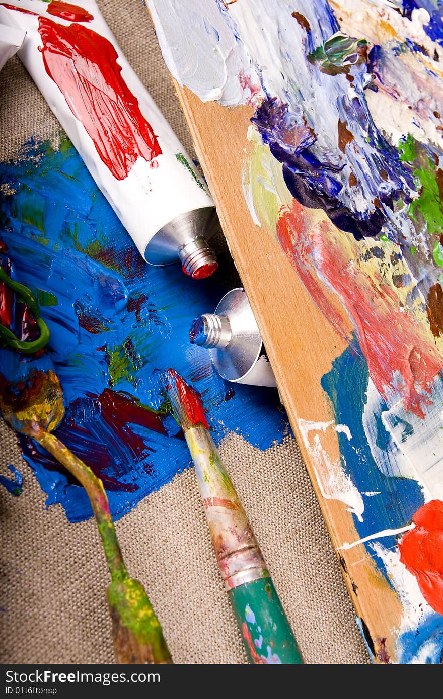 Paint tubes on linen canvas