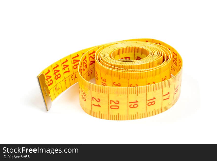 Curled yellow measuring tape on white background