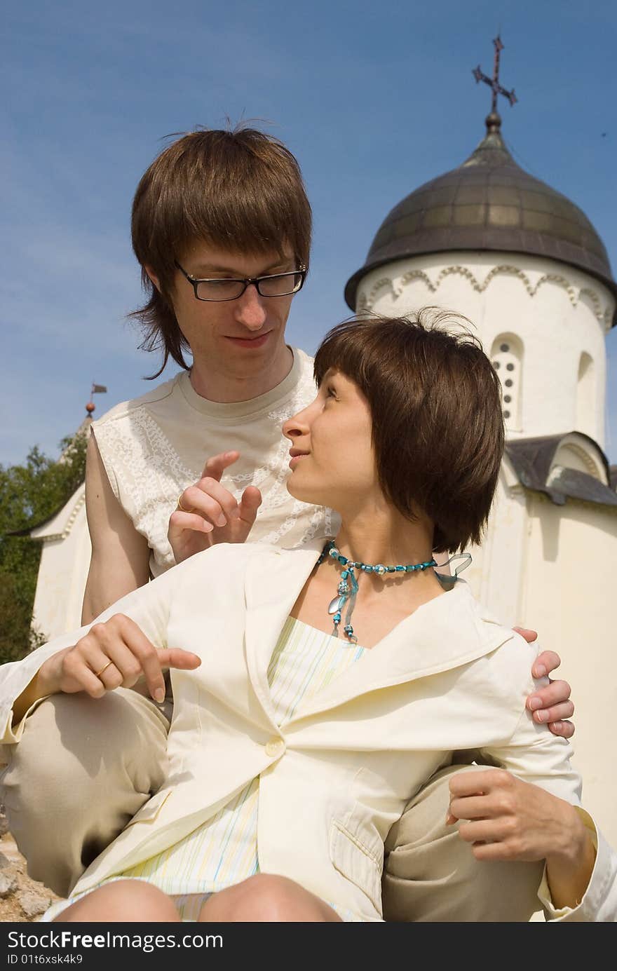 Boy and girl at a white church. Boy and girl at a white church