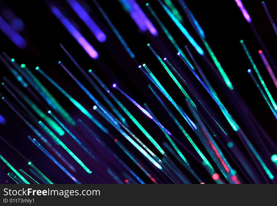 Close-up of illuminated optical fibers. Close-up of illuminated optical fibers