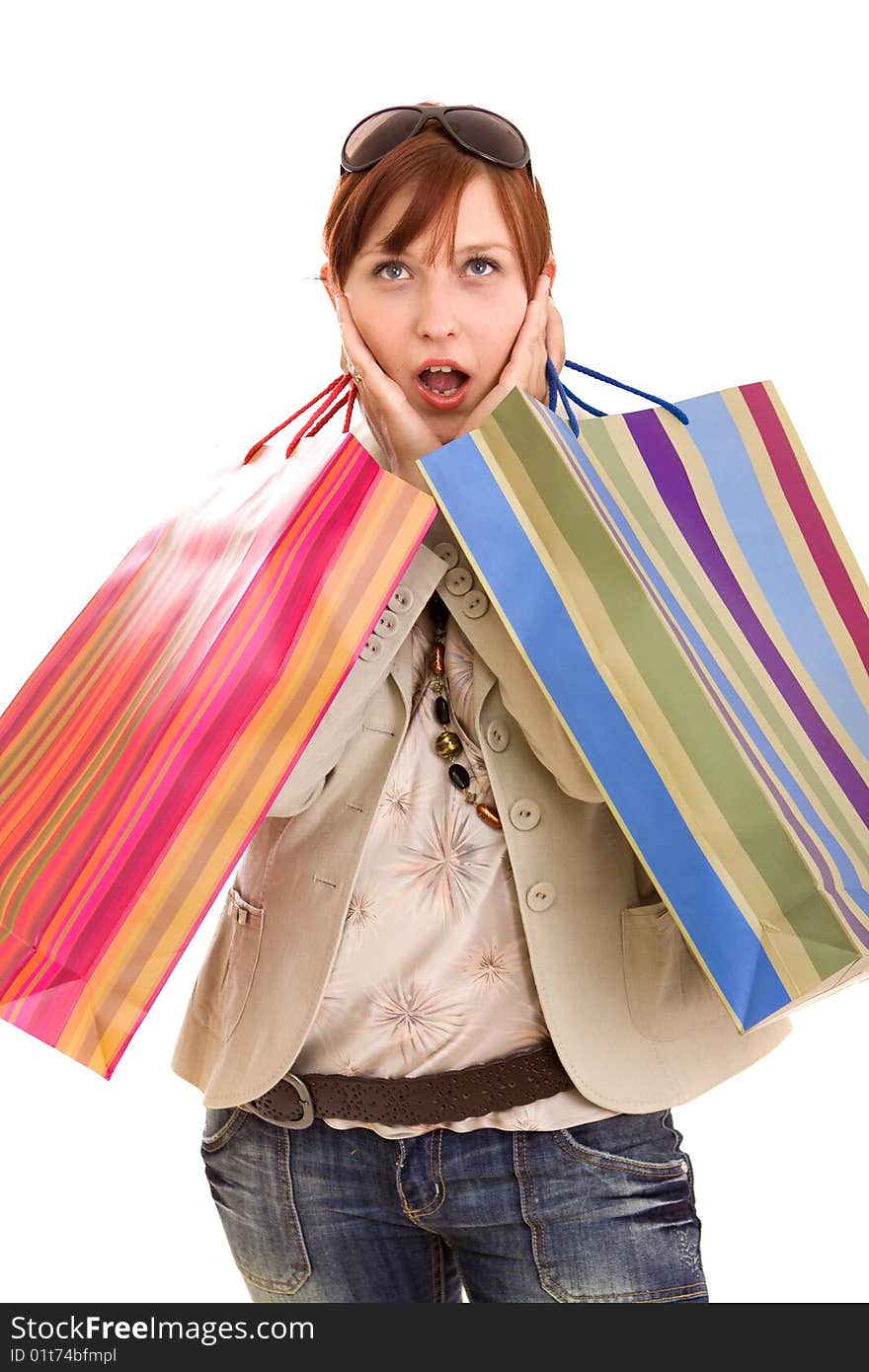 Young brunette woman with shopping bags. Young brunette woman with shopping bags