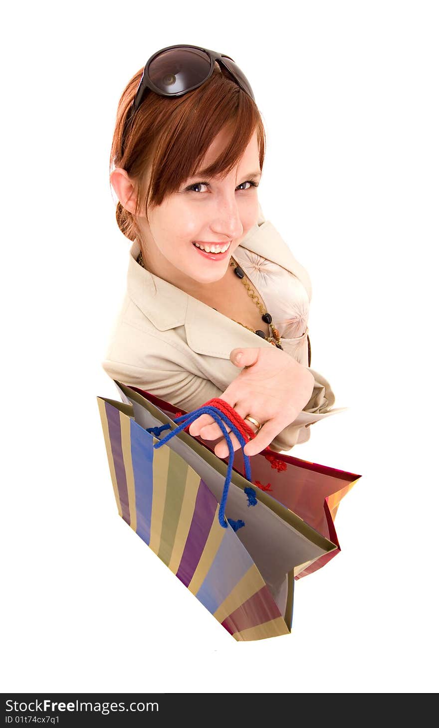 Young brunette woman with shopping bags. Young brunette woman with shopping bags