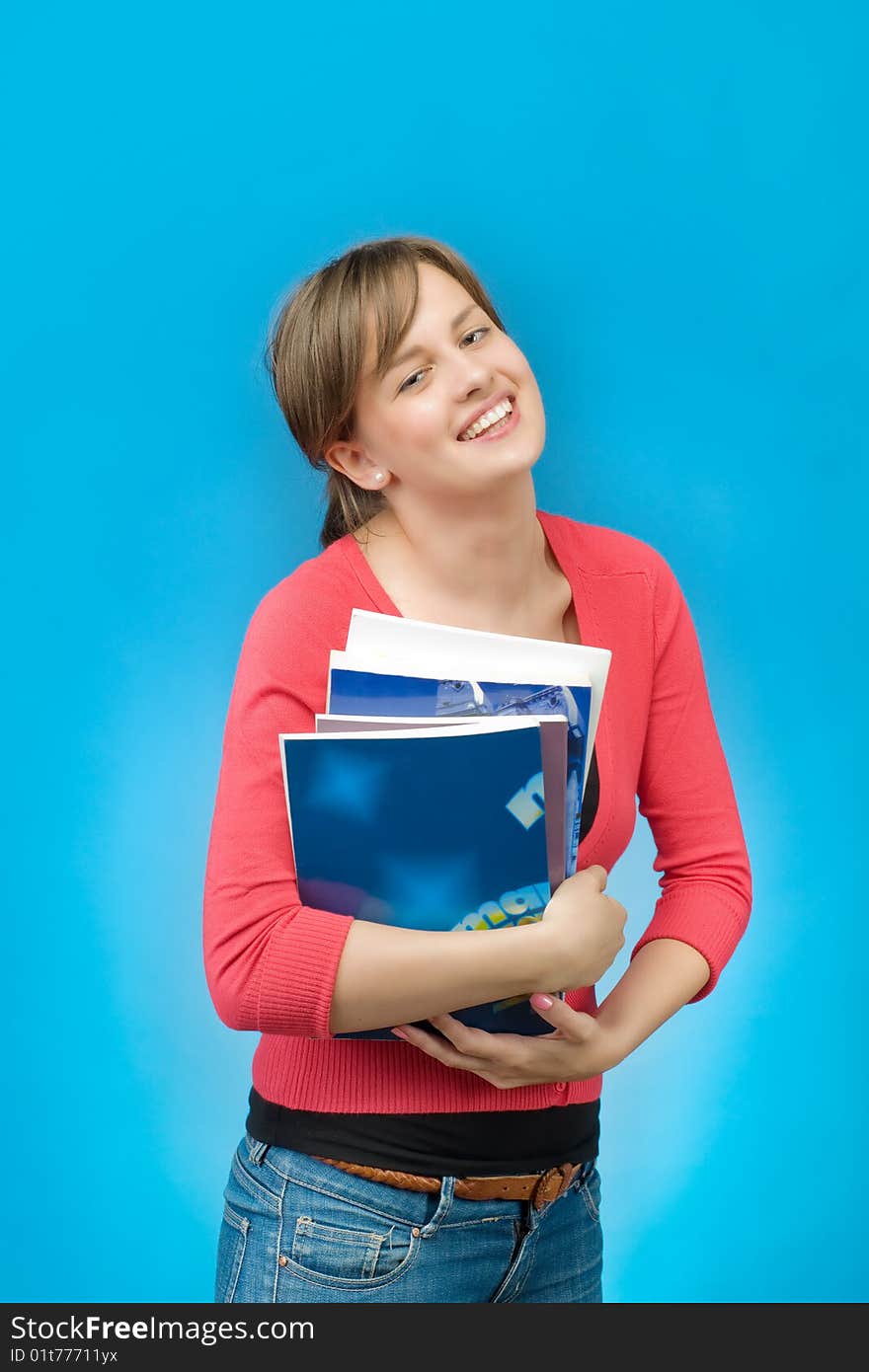 Beautiful smiling woman with books. Beautiful smiling woman with books