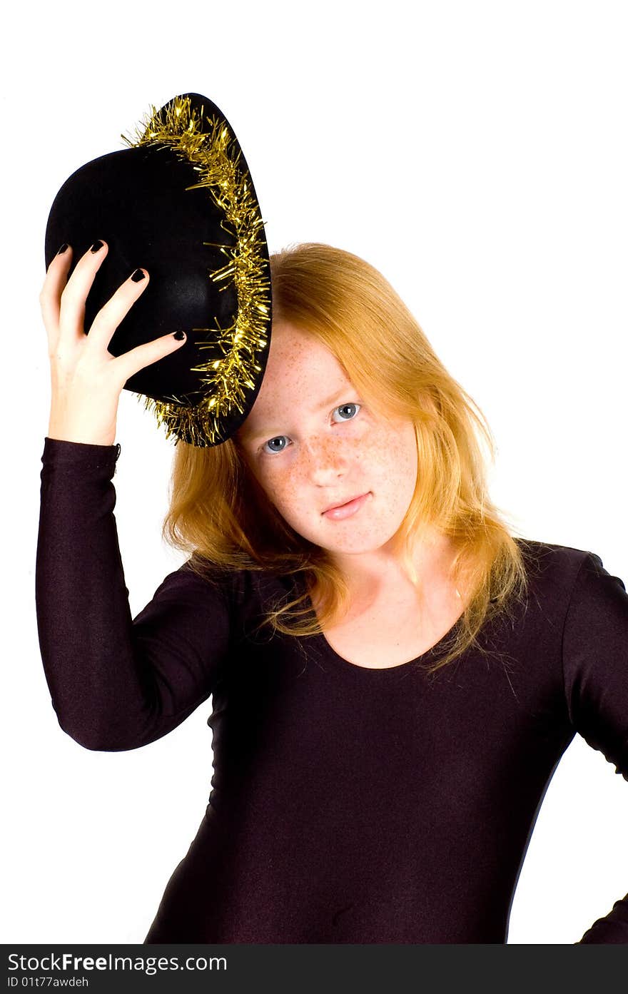 Girl is wearing a black hat with golden streamer isolated on white