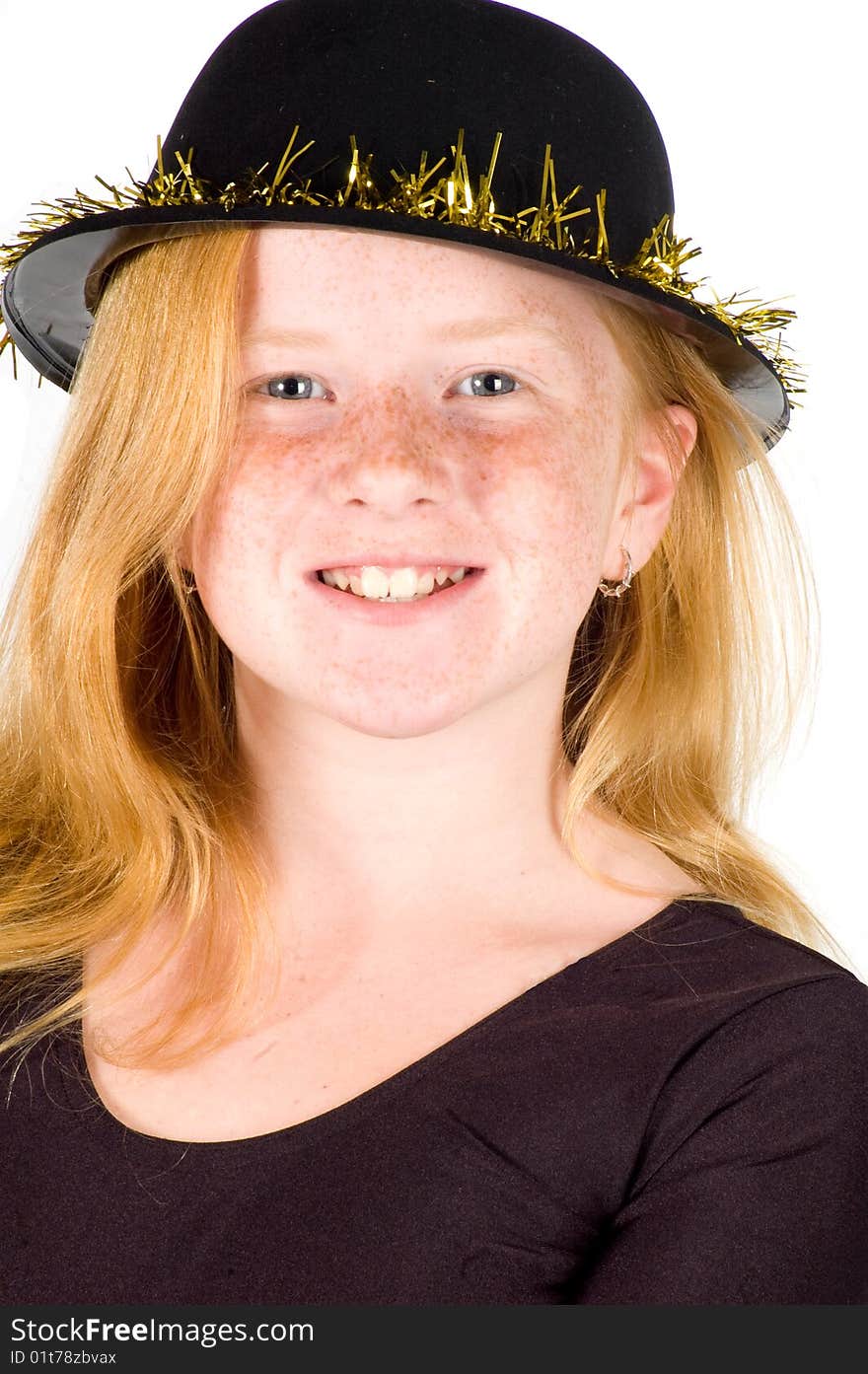 Girl is wearing a black hat with golden streamer isolated on white