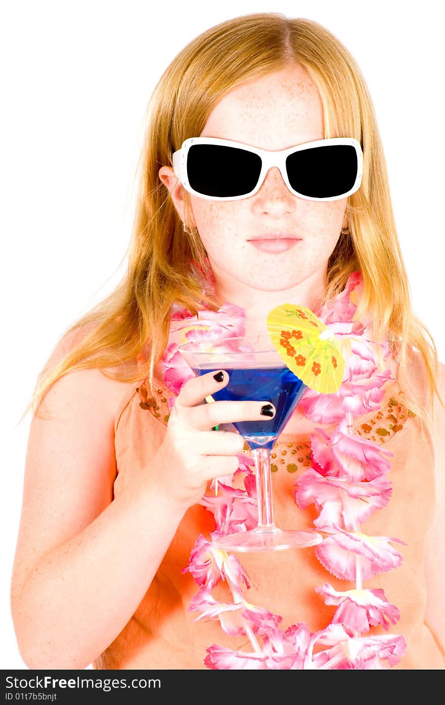 Girl is drinking a blue cocktail wearing sunglasses isolated on white