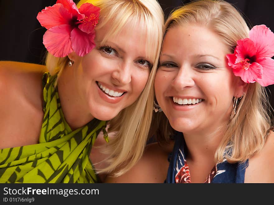 Beautiful Smiling Girls With Hibiscus Flower