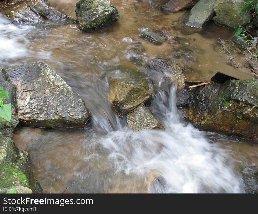 Photo of a small waterfall at the flight of the gibbon office 1 hour from chiang mai. Photo of a small waterfall at the flight of the gibbon office 1 hour from chiang mai.