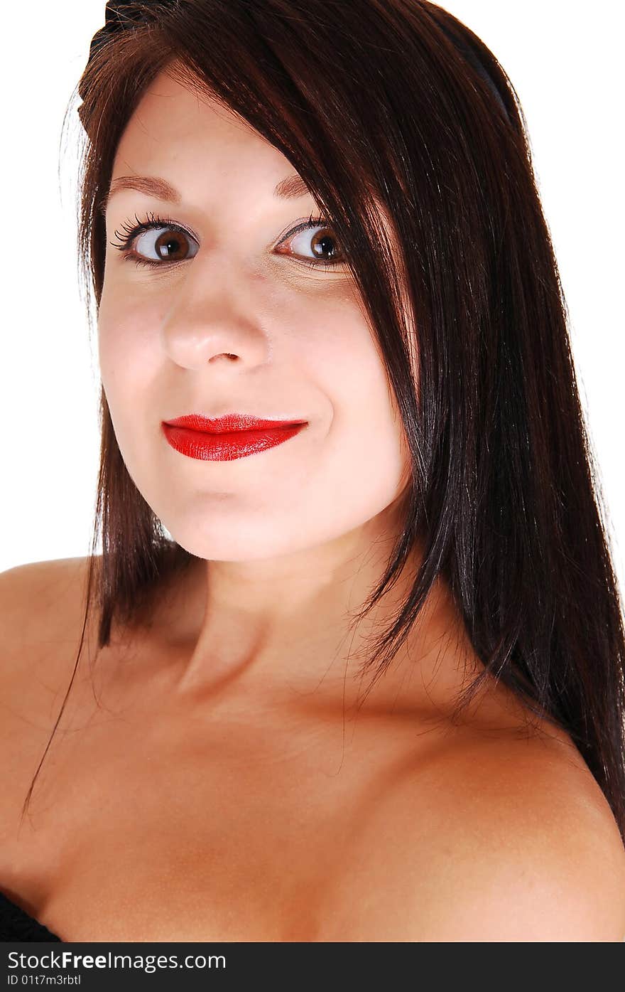 Portrait of a very beautiful dark haired woman in a black dress, smiling in the camera. For white background. Portrait of a very beautiful dark haired woman in a black dress, smiling in the camera. For white background.