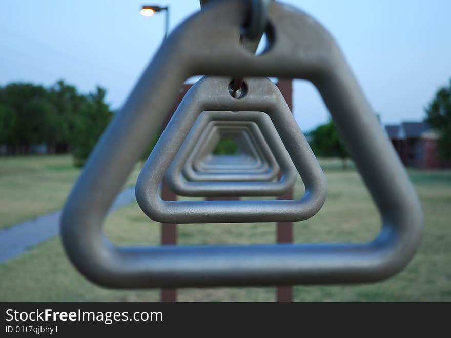 Monkey Rings along a running trail in Altus, OK; a challenge for five year olds, and nearly impossible after 40. Monkey Rings along a running trail in Altus, OK; a challenge for five year olds, and nearly impossible after 40.