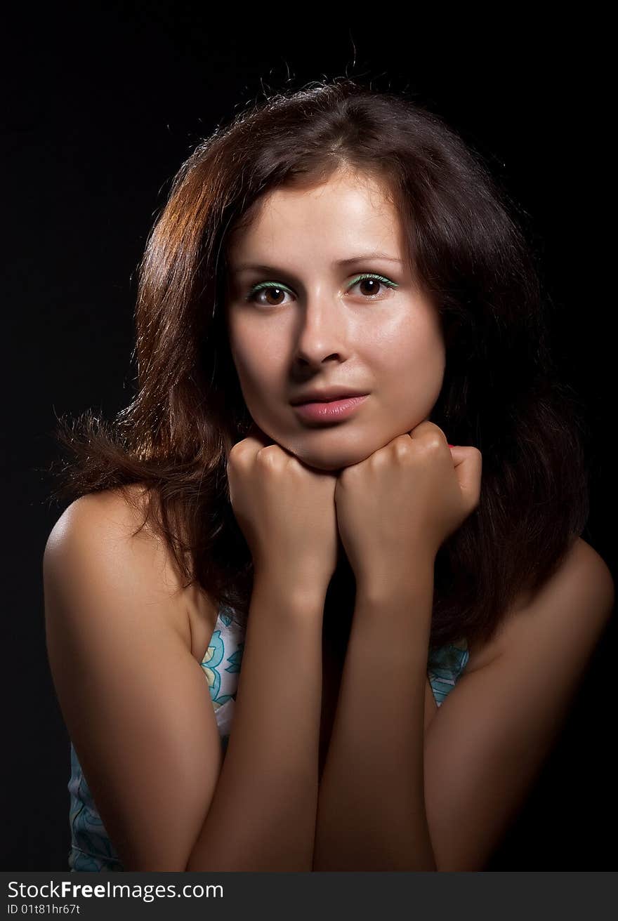 Cute teenager. Isolated on a black background