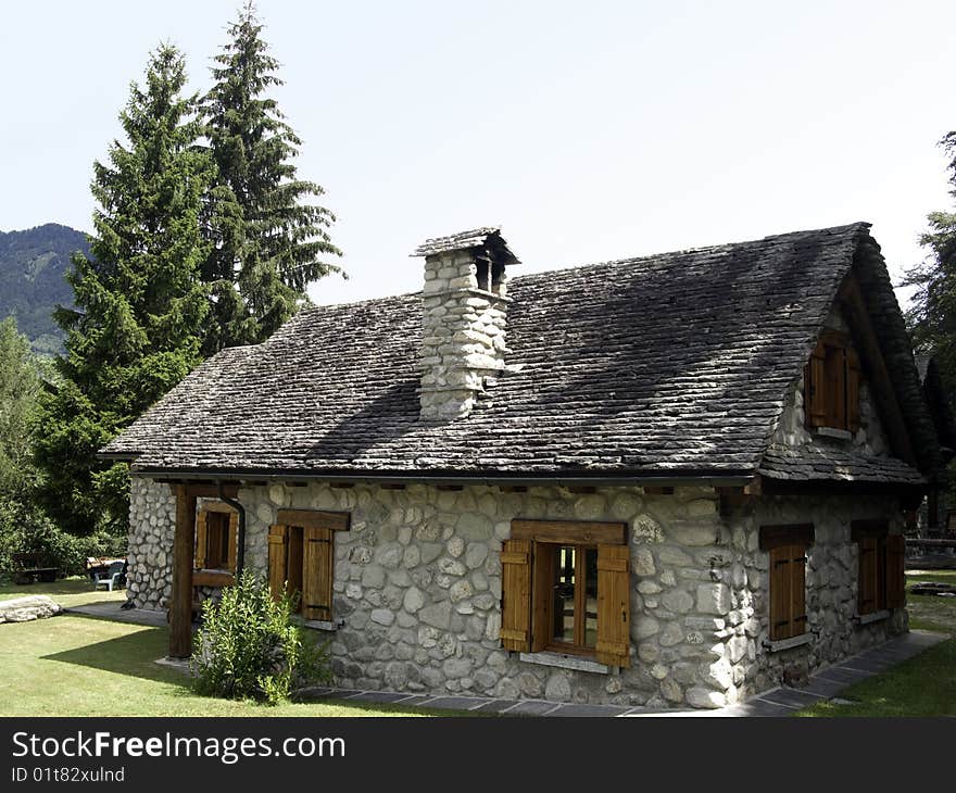 A hut made of rock in italian mountain. A hut made of rock in italian mountain