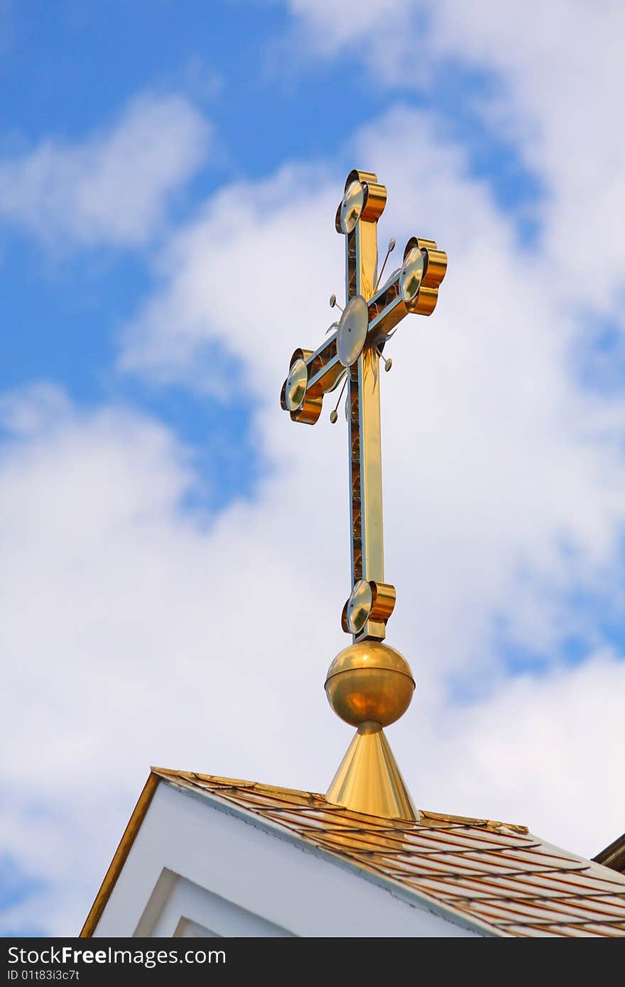 Cross on the roof of church.