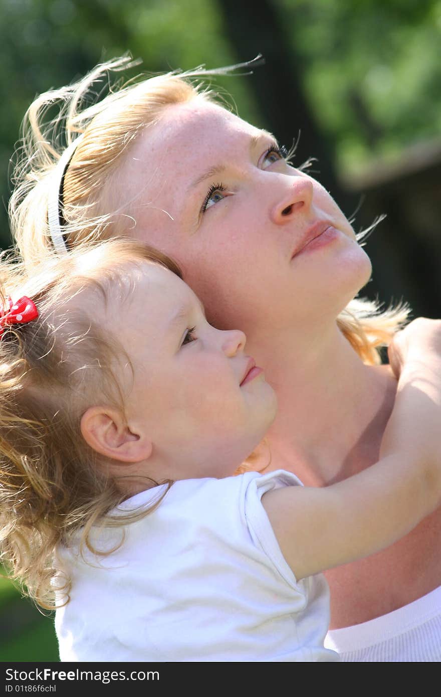 Mother with little daughter outdoors. Mother with little daughter outdoors