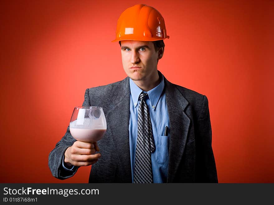 The man in a helmet with a hammer and yoghurt