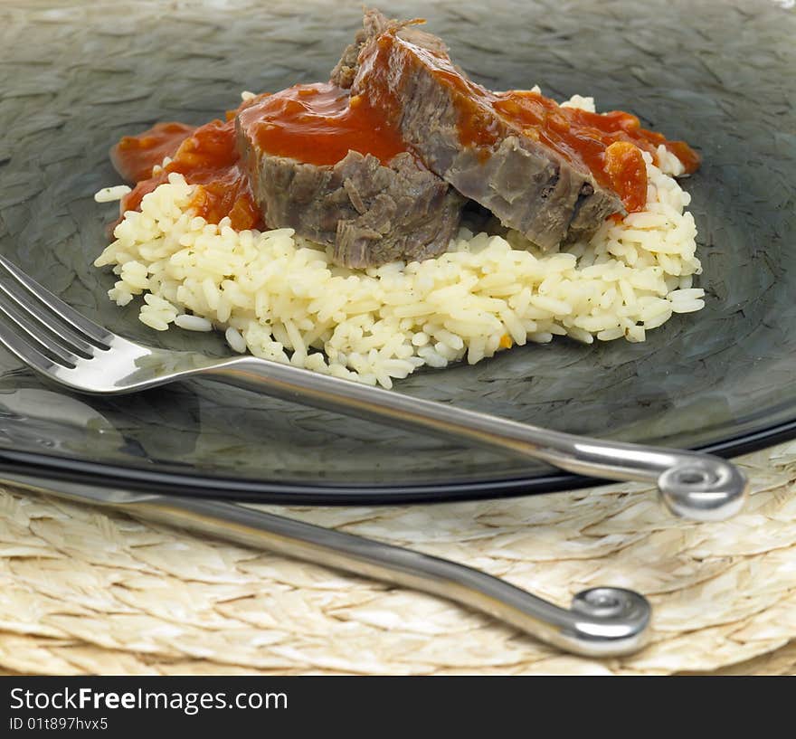 Beef meat with tomato sauce