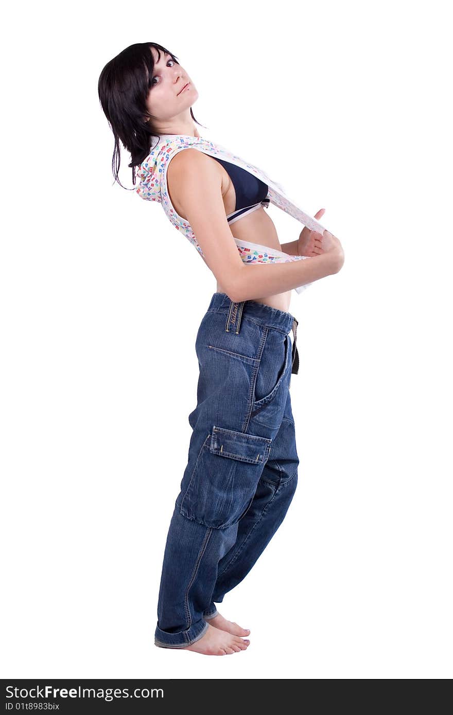 The young beautiful girl on a white background