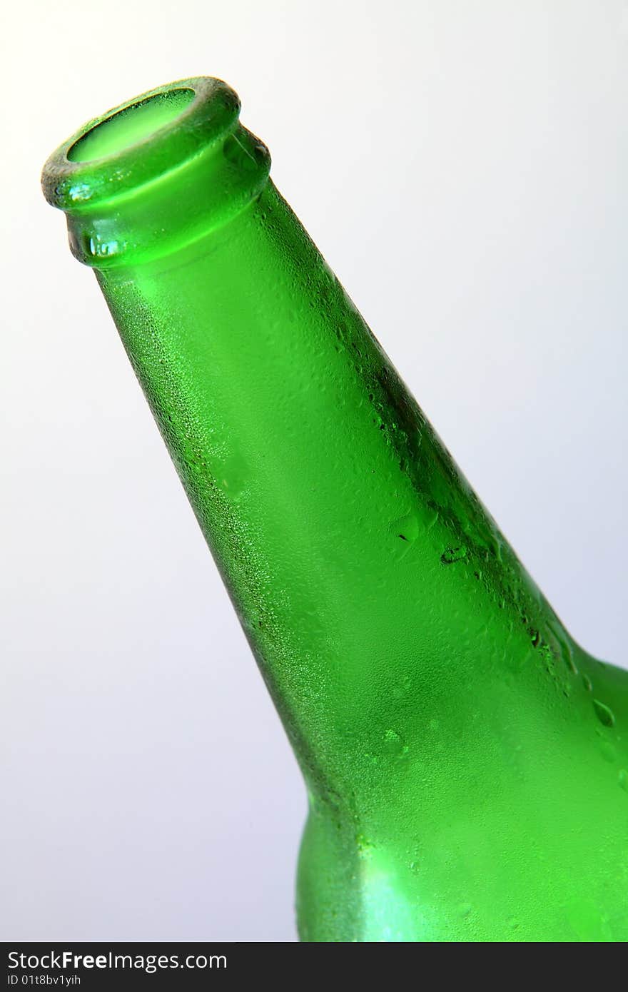 Green beer bottle isolated on white background