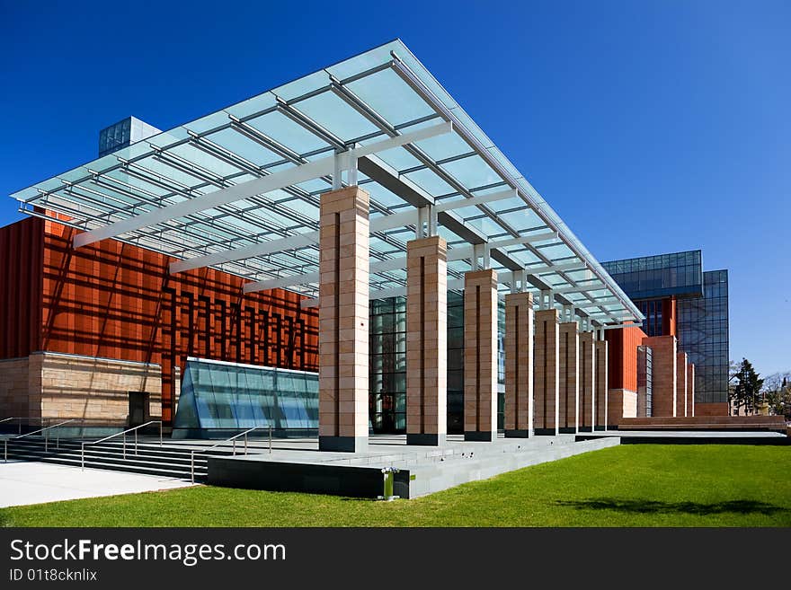 Modern office building with a glass roof and columns