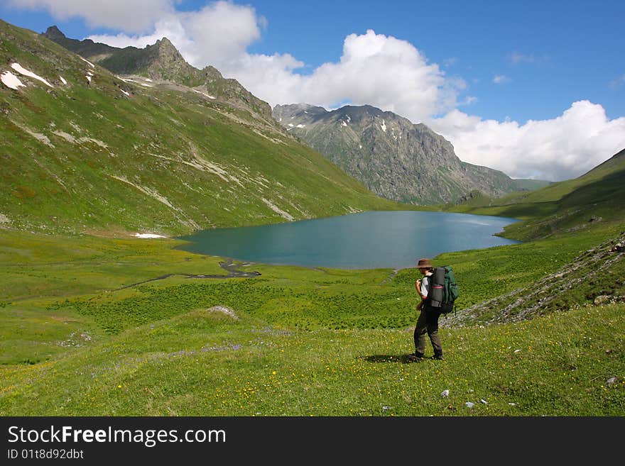 Hiker boy in Caucasus mountains