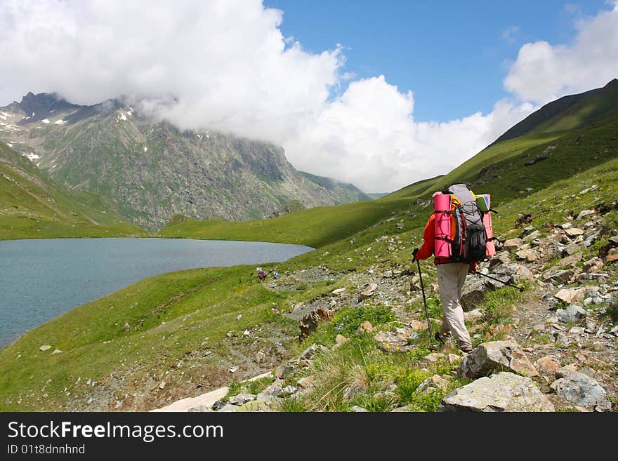 Hiker boy in Caucasus mountains