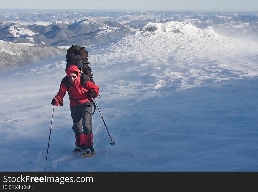 Hiker boy in winter mountains. Hiker boy in winter mountains