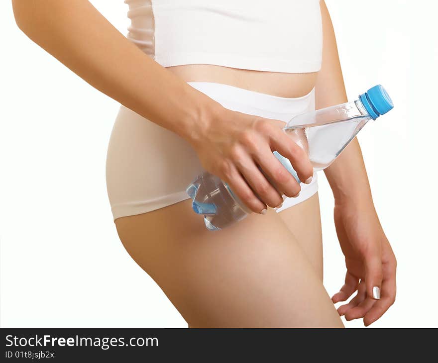 Young girl with bottle of water on isolated. Young girl with bottle of water on isolated