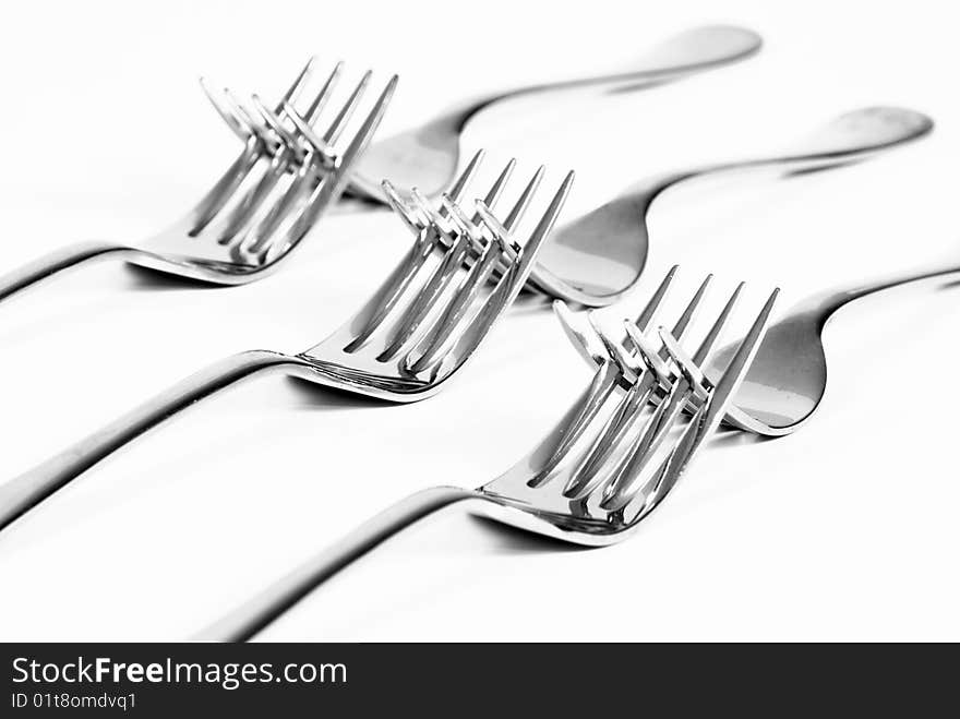 Forks entangled with each other. Forks entangled with each other