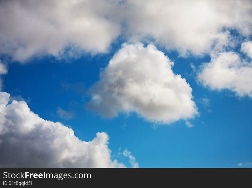 White and grey clouds on sunny sky