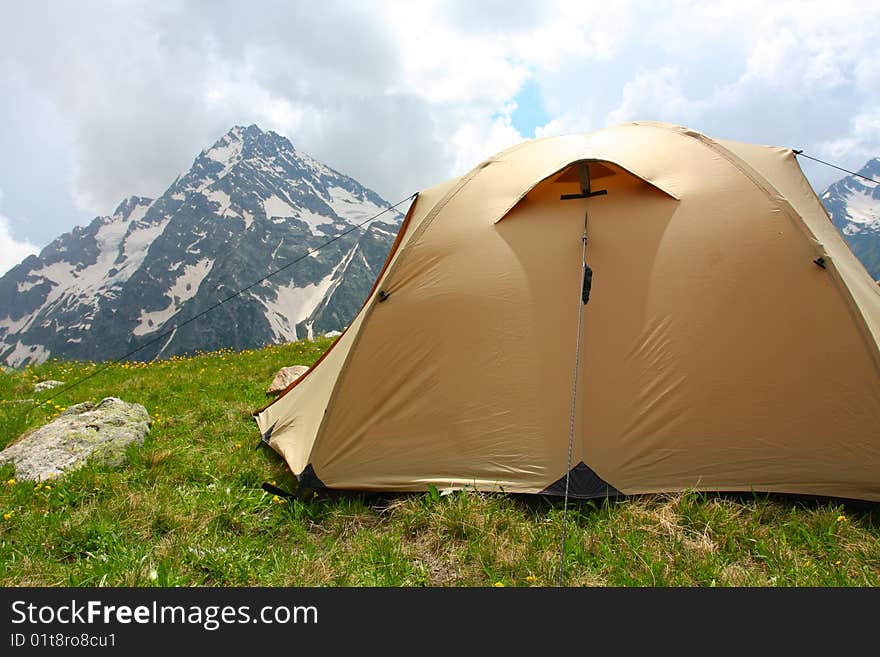 Yelow tent in Caucasus mountain