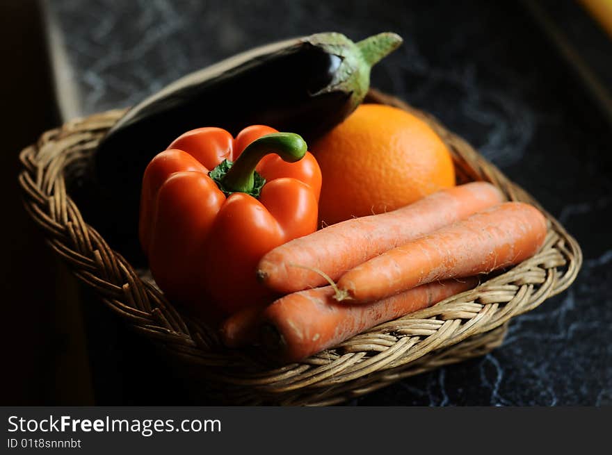 Carrots paprika eggplant and orange. Carrots paprika eggplant and orange