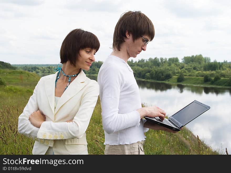 The man and women with laptop