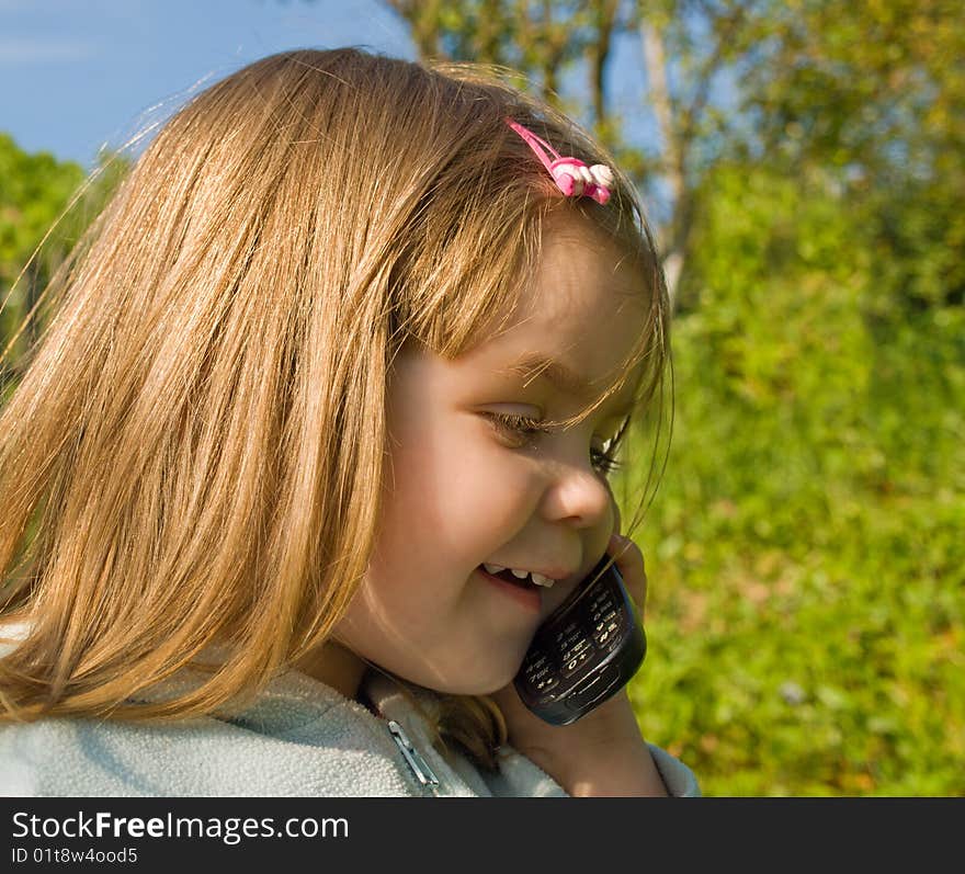 Little girl with phone