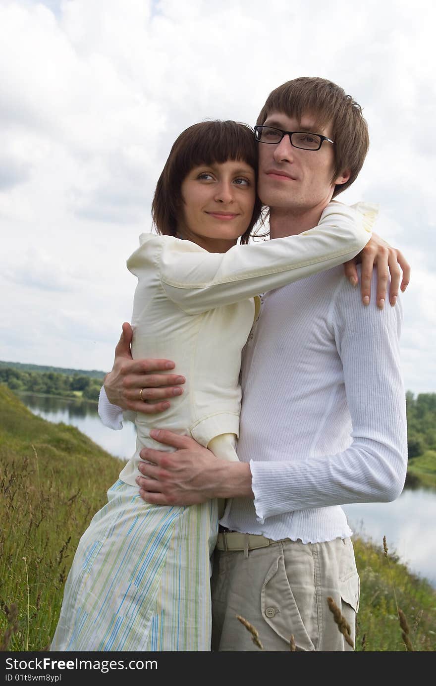 Boy and girl on a green grass. Boy and girl on a green grass