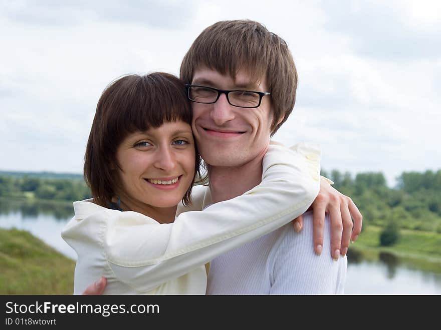 Boy and girl on a green grass. Boy and girl on a green grass