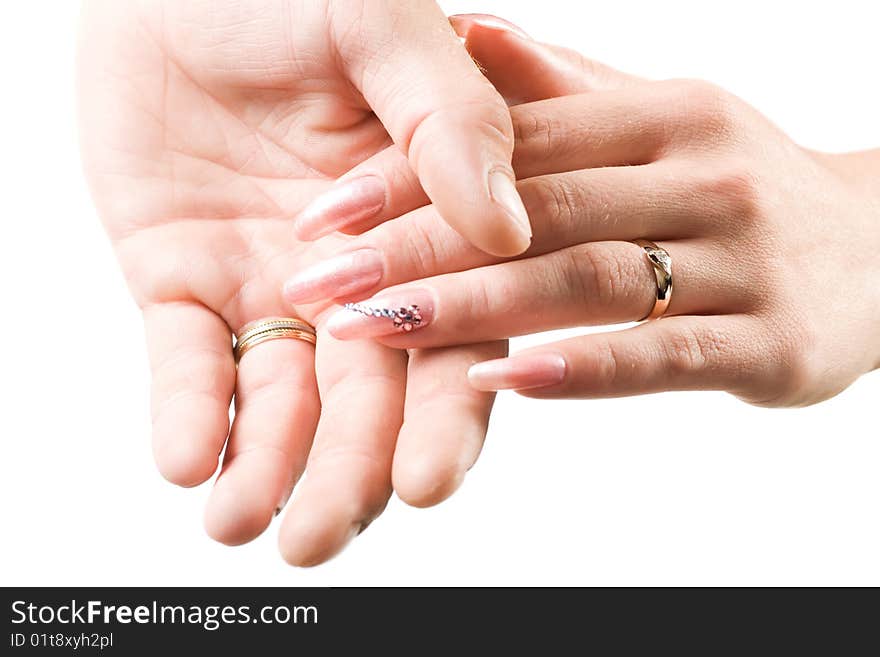 Photo of male and female hands with rings