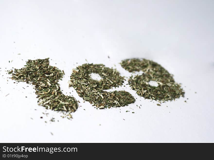 Word tea from aromatic green leaves on white background. Word tea from aromatic green leaves on white background